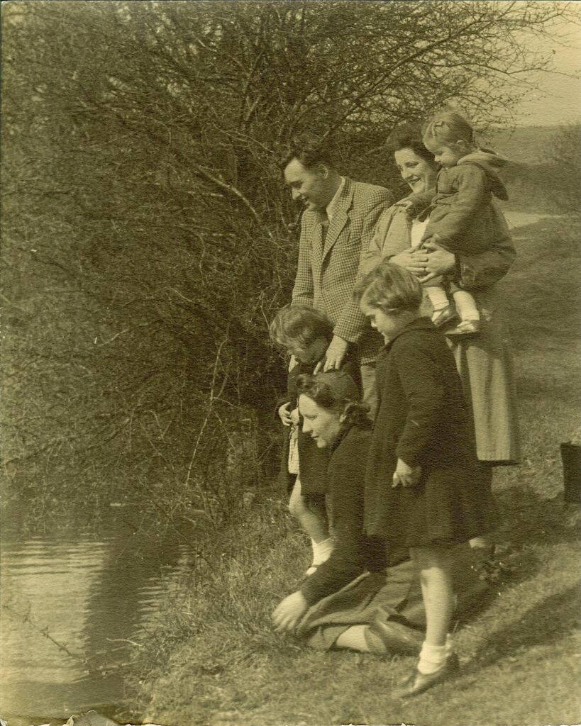 The Len and his family by the water.